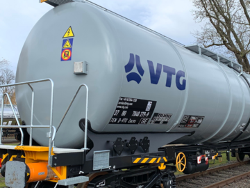 Gray tank car with blue VTG logo on track